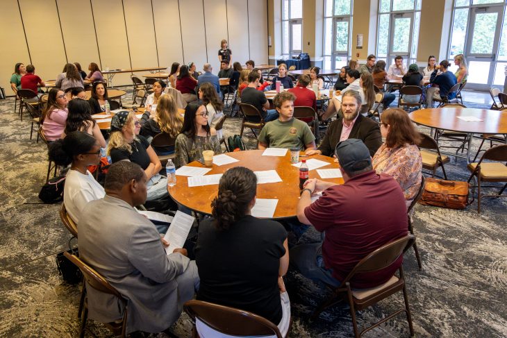 Matthew Young, assistant professor of political science and public policy, leads a discussion during the Talking Across Difference: An In-the-Moment Dialogue event on Sept. 15 in McKinnon Hall.