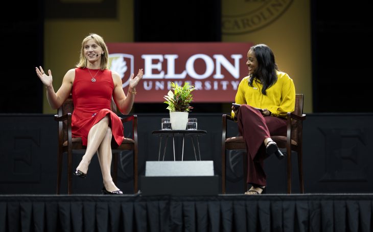 Olympian Katie Ledecky speaks with Elon University alum Zora Stephenson '15 during the 2025 Fall Convocation in Schar Center on Sept. 26, 2025.