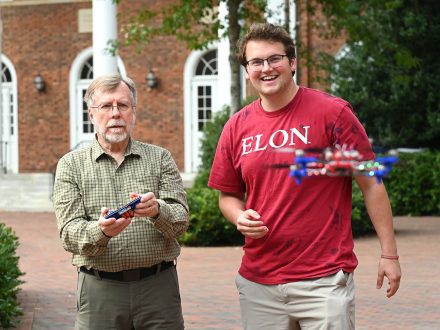 Scott Borland ’26 with Elon professor Randy Piland