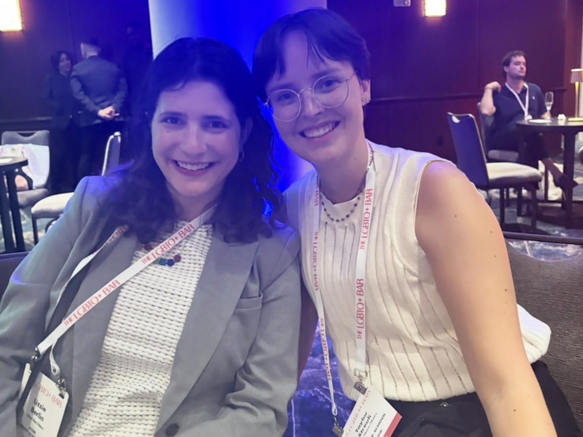 two women pose for a selfie