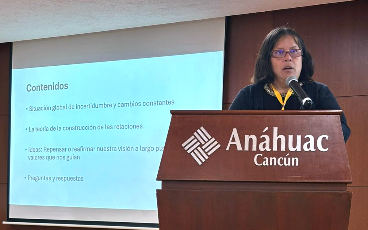 Elon's Vanessa Bravo at a podium in Mexico.