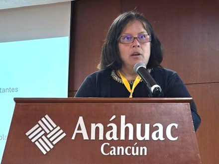 Elon's Vanessa Bravo at a podium in Mexico.