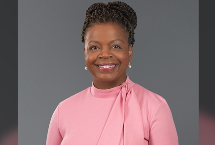directory portrait of Cheri Beasley, smiling wearing a pink sweater