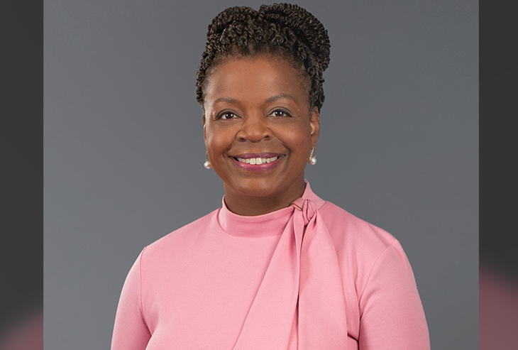 directory portrait of Cheri Beasley, smiling wearing a pink sweater
