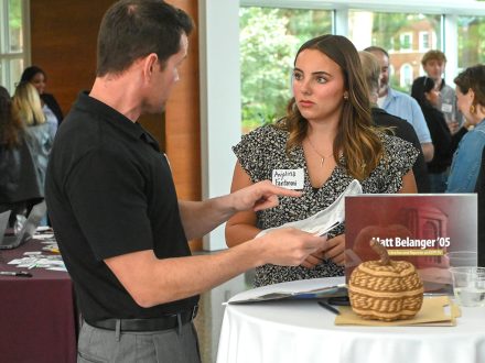 Matt Belanger ’05 stands with Anjolina Fantaroni ’26 