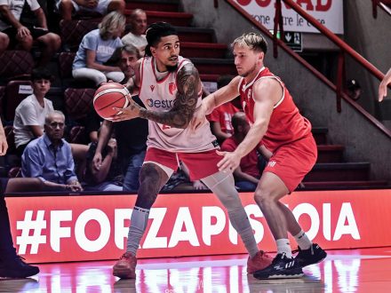 Pistoia basketball player is closely guarded.