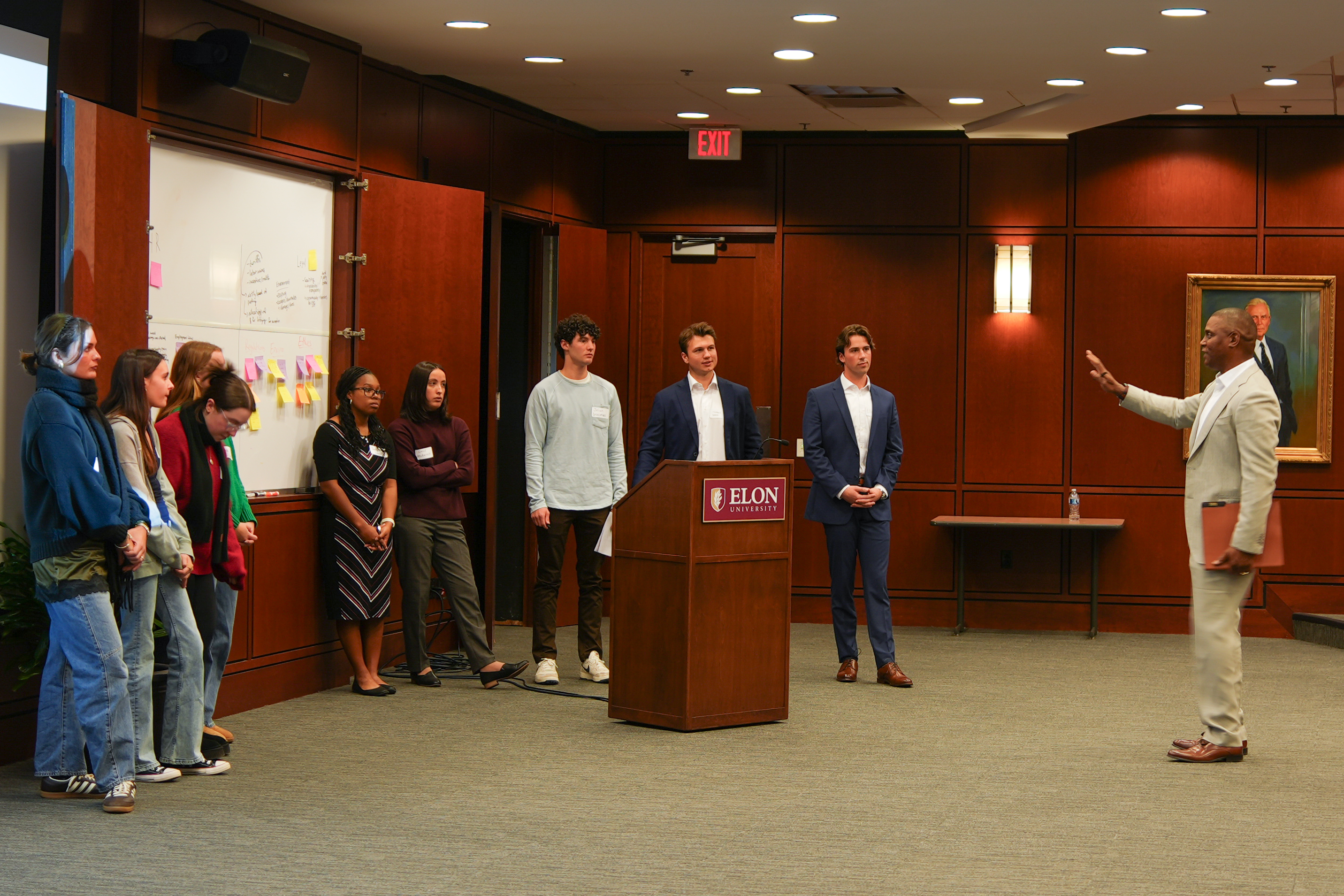 Sean Suggs giving feedback to the students participating in the case study.