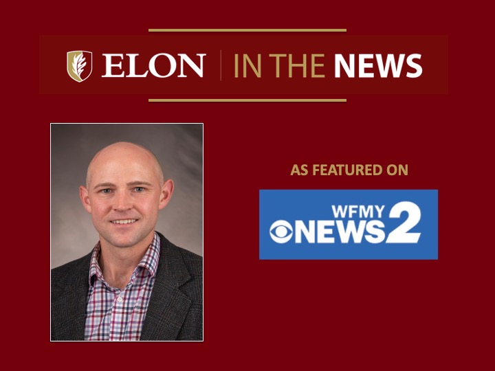 Red “Elon in the News” graphic featuring a professional headshot of a bald man in a blazer and plaid shirt, next to “As featured on WFMY News 2” and the station logo.