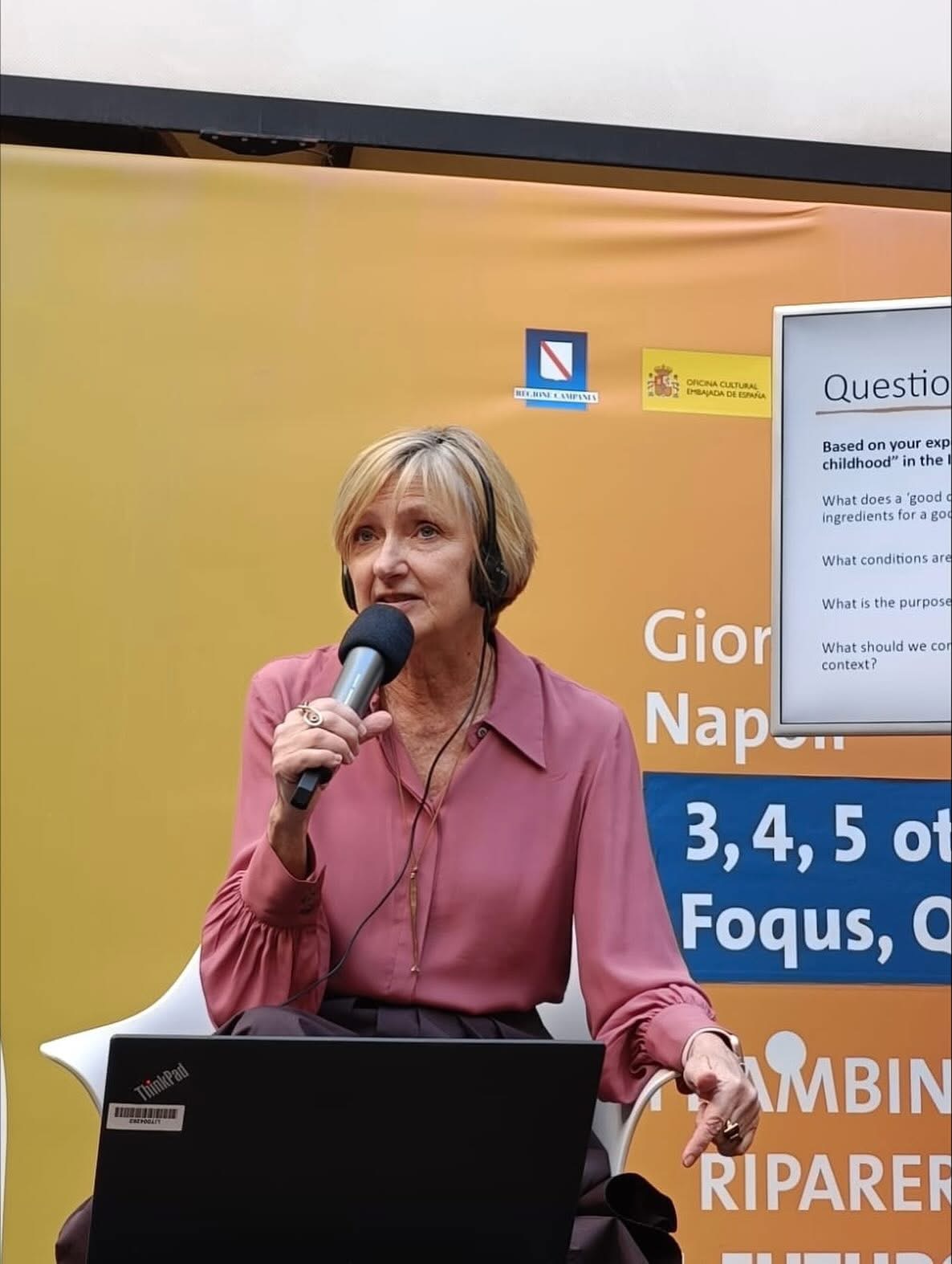 Maureen Vandermaas-Peeler speaks into a microphone