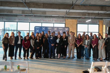 Elon University current students and alumni at the Opex Technology event on Nov. 19