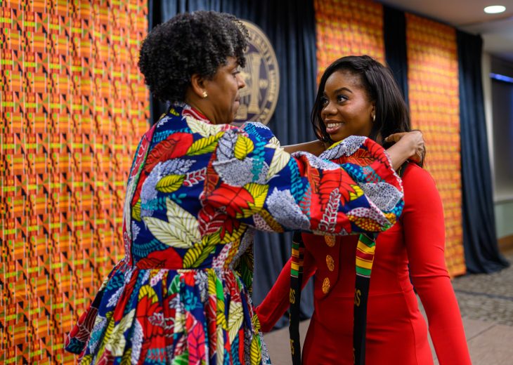 Graduates who participated in the Donning of the Kente program each received a stole made of kente cloth to be worn at Commencement.