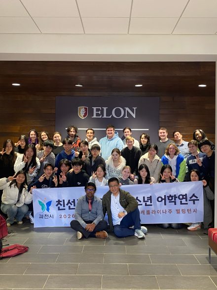 Group photo of Elon game design students and South Korean high school students. 