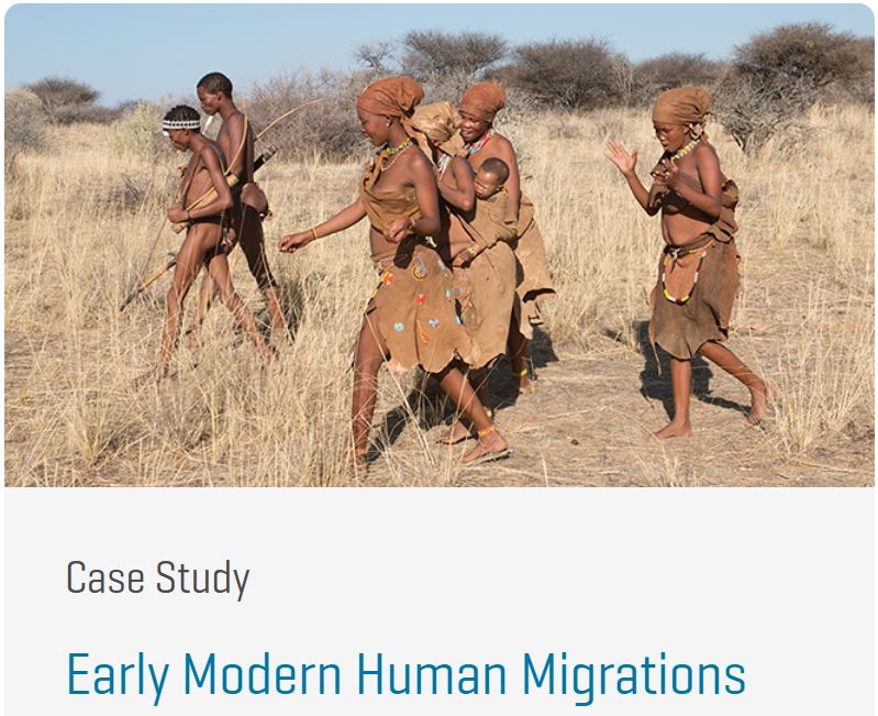 Image features San women and children walking through a grassland