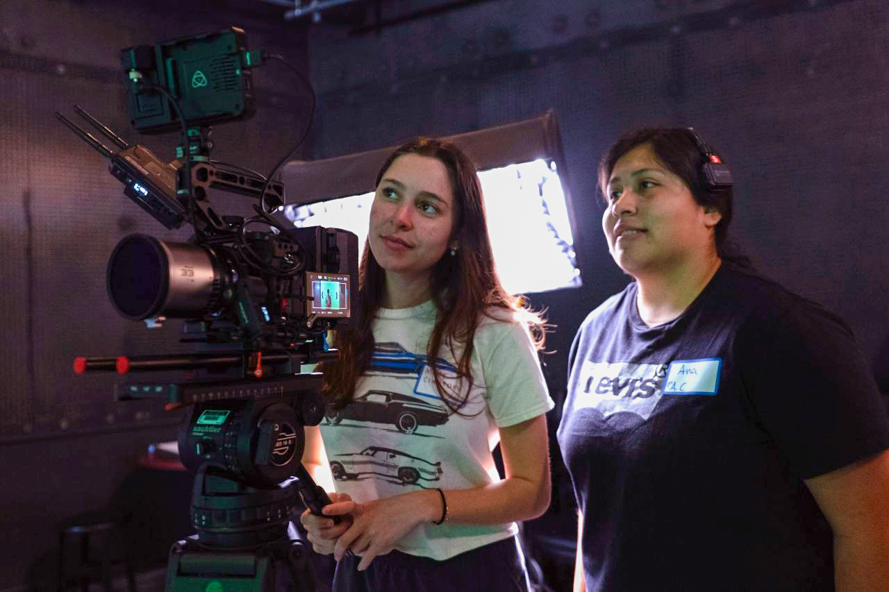 Elon student Molly Clayton with a camera