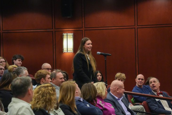 Student asking question to Jonathan Reckford at event