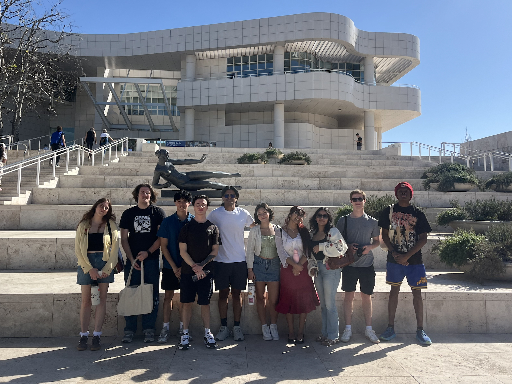 A group of Elon University students pose in front of the Getty Center