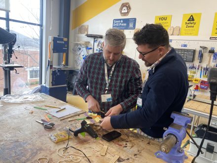 Two men designing in the MakerHub.