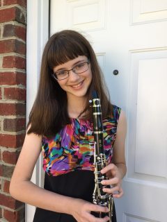 Karsyn Vann in sixth grade holding her clarinet