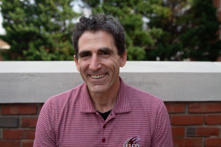 Joel Karty smiling with eyebrows 