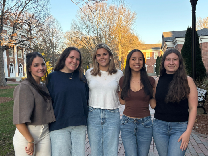 Gabriela Alvarez, fourth from right, standing with her fellow Live Oak Account Executives.