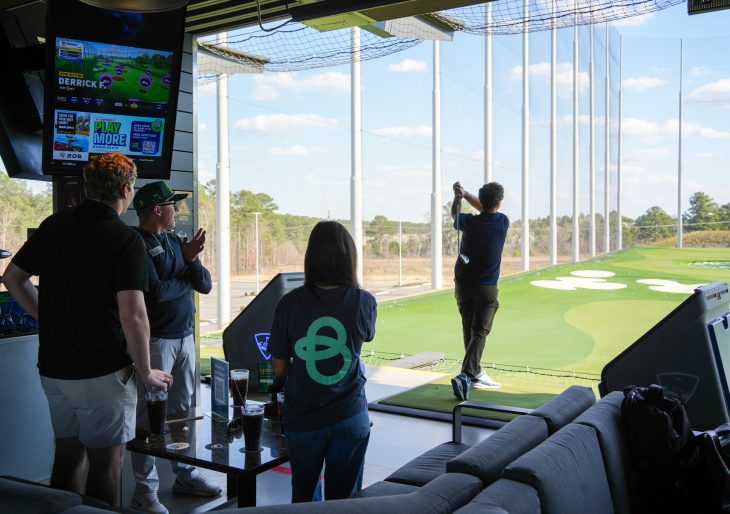 Students and Chandler Center partners gathered at Topgolf for a networking event