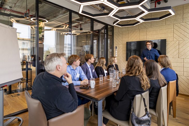 The students practicing with Scott Hayward, associate professor of management