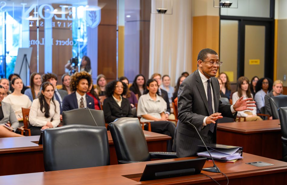 Reginaldo Williams L'11 stands at a counsel desk inside the Robert E. Long Courtroom on April 15, 2027.