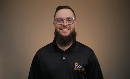 Jensen Roll '16, smiles for a Roll Construction photo.