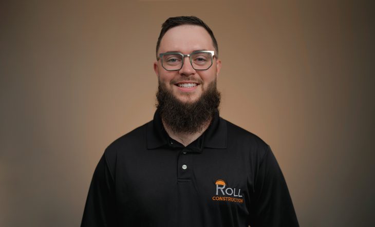 Jensen Roll '16, smiles for a Roll Construction photo.