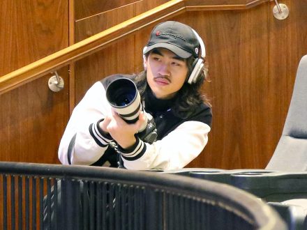 Elon University junior Ethan Wu with camera