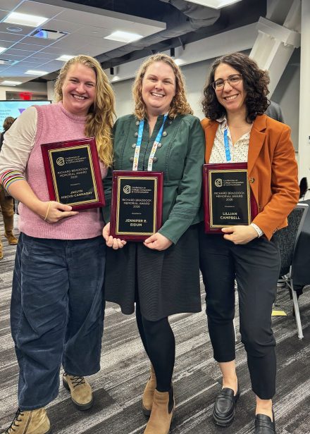 Jaclyn Fiscus-Cannaday, Jennifer Eidum and Lillian Campbell holding their plaques that they received for the CCCC Richard Braddock Award.
