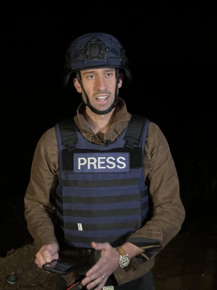 Doug Williams, wearing protective gear, seen reporting from Tel Aviv in late 2023 for CBS New York.