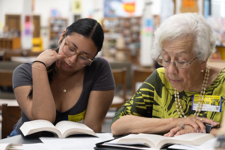 Power+Place Collaborative 2025 storyteller Martha Krall reads with design catalyst Berenice Sanchez-Rosaldo at Walter Williams High School with Civil Literacy students. Photo by Venus Soto Castaneda '27.