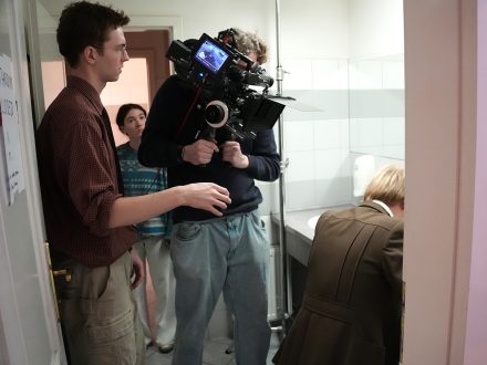 McCollum works a camera on Night Shift set.