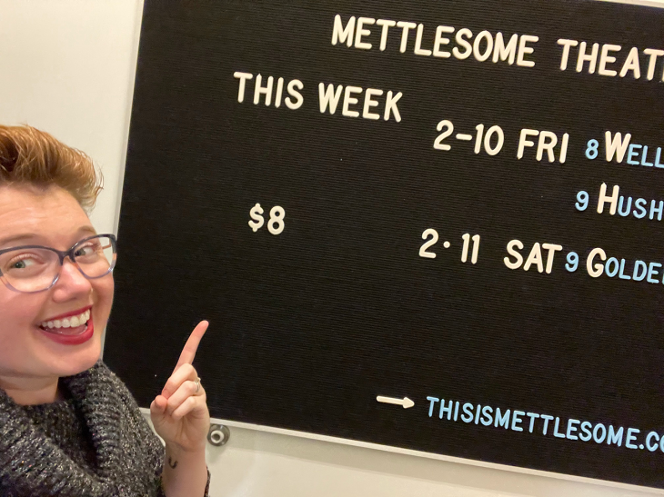 April Dudash in front of mettlesome marquee