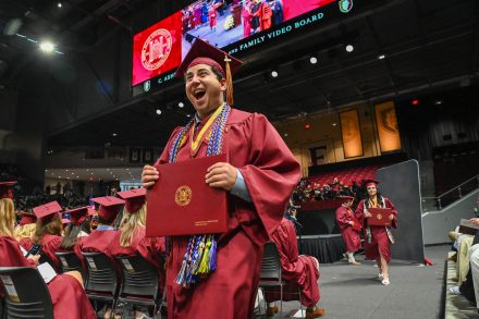 Benji Stern holds diploma
