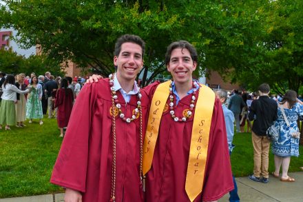 Julien and Liam Dupas pose after graduation
