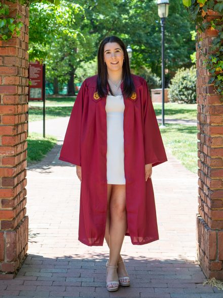 Abby Selikoff ’26 stands in Elon University’s Historic Neighborhood