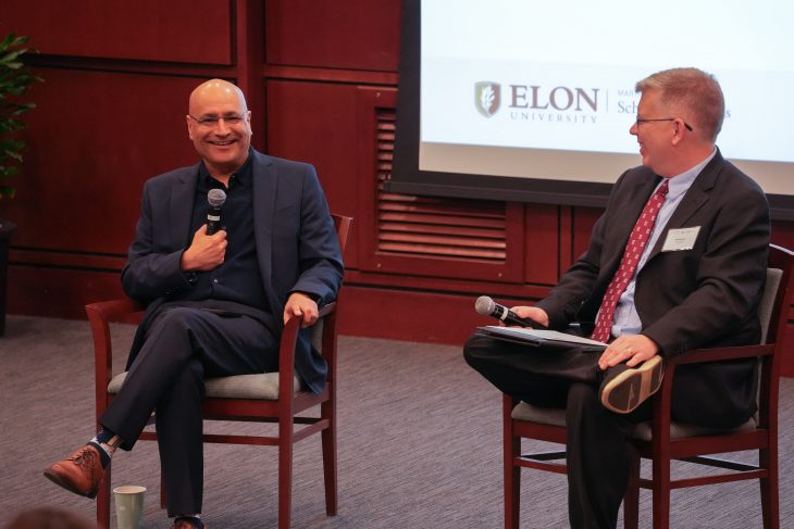 Anuj Mehrotra, dean of Georgia Tech’s Scheller College of Business, and Jeff Sanders ’00, chief architect at Microsoft