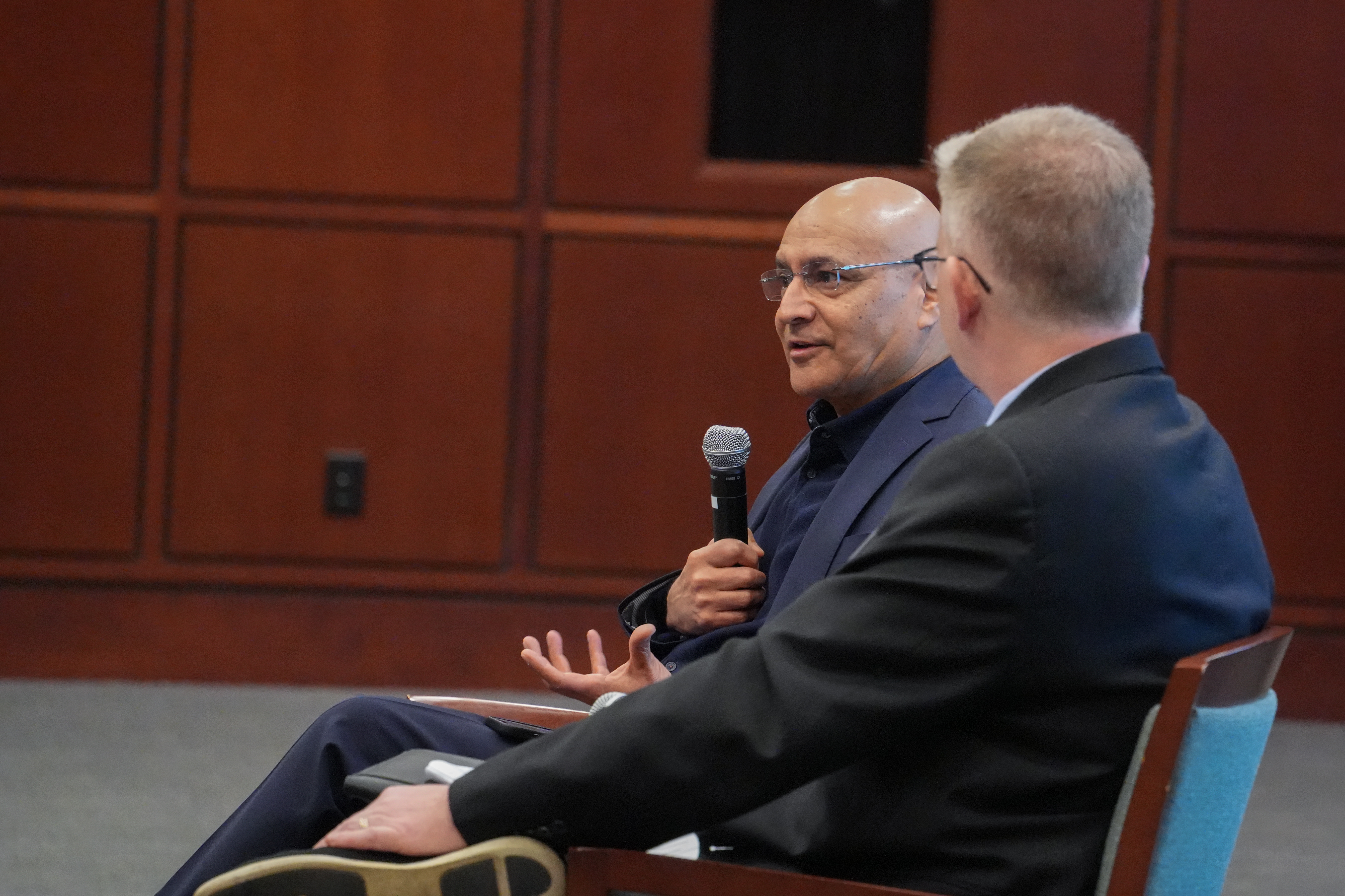 Anuj Mehrotra, dean of Georgia Tech’s Scheller College of Business, and Jeff Sanders ’00, chief architect at Microsoft