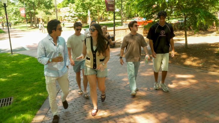Vargas-Lopez and Chiriboga with friends on Elon's campus