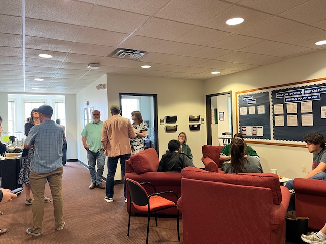 Political science and public policy faculty and staff gather to celebrate the work of two-term editorship of their national undergraduate research journal
