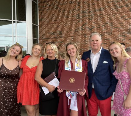 The Hart family posed for a photo during Emily's graduation.