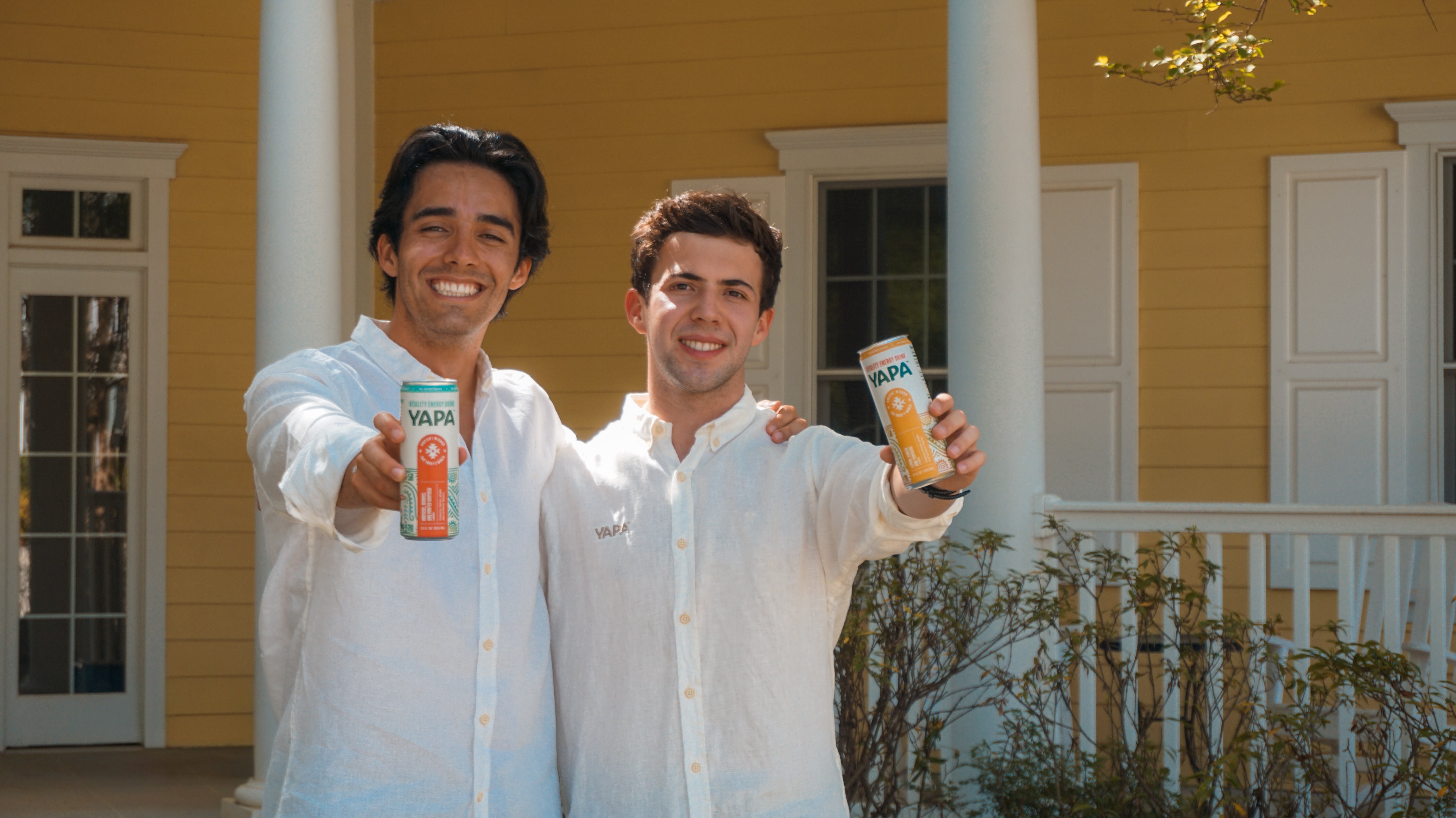 Bernardo Vargas-Lopez '26, a sport management major from Austin, Texas, and Juan Daniel Chiriboga '26 show off their product YAPA