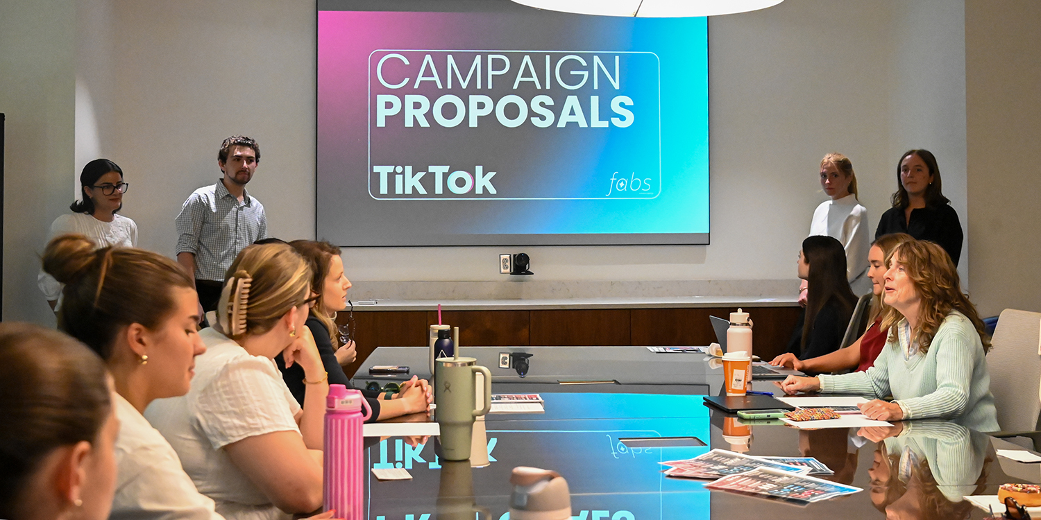 Professor Lee Bush’s Strategic Campaigns class in a conference room