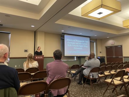 Tori Layton presenting research.