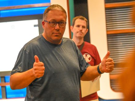 Colin Donohue talks as Kelly Furnas looks on.
