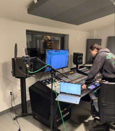 Carter Puckett '26 recording music and voiceover for Your Friend, Sam in the Elon Recording Studio.