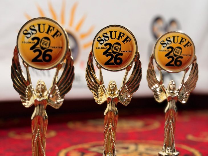 A staged photo of three awards