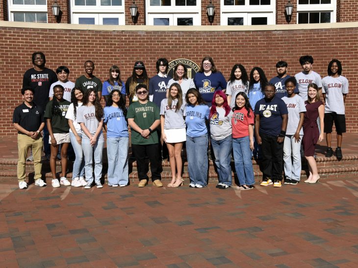 Members of the Elon Academy's Sigma Class with Elon President Connie Ledoux Book (back row, center); Elon Academy Director Emily Wiersma (front row, far right); and Elon Academy Assistant Director of College Success Manny Campos (front row, far left).